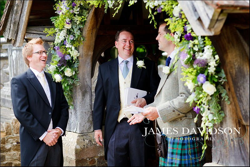 surrey wedding photographer 08 groom waiting at church